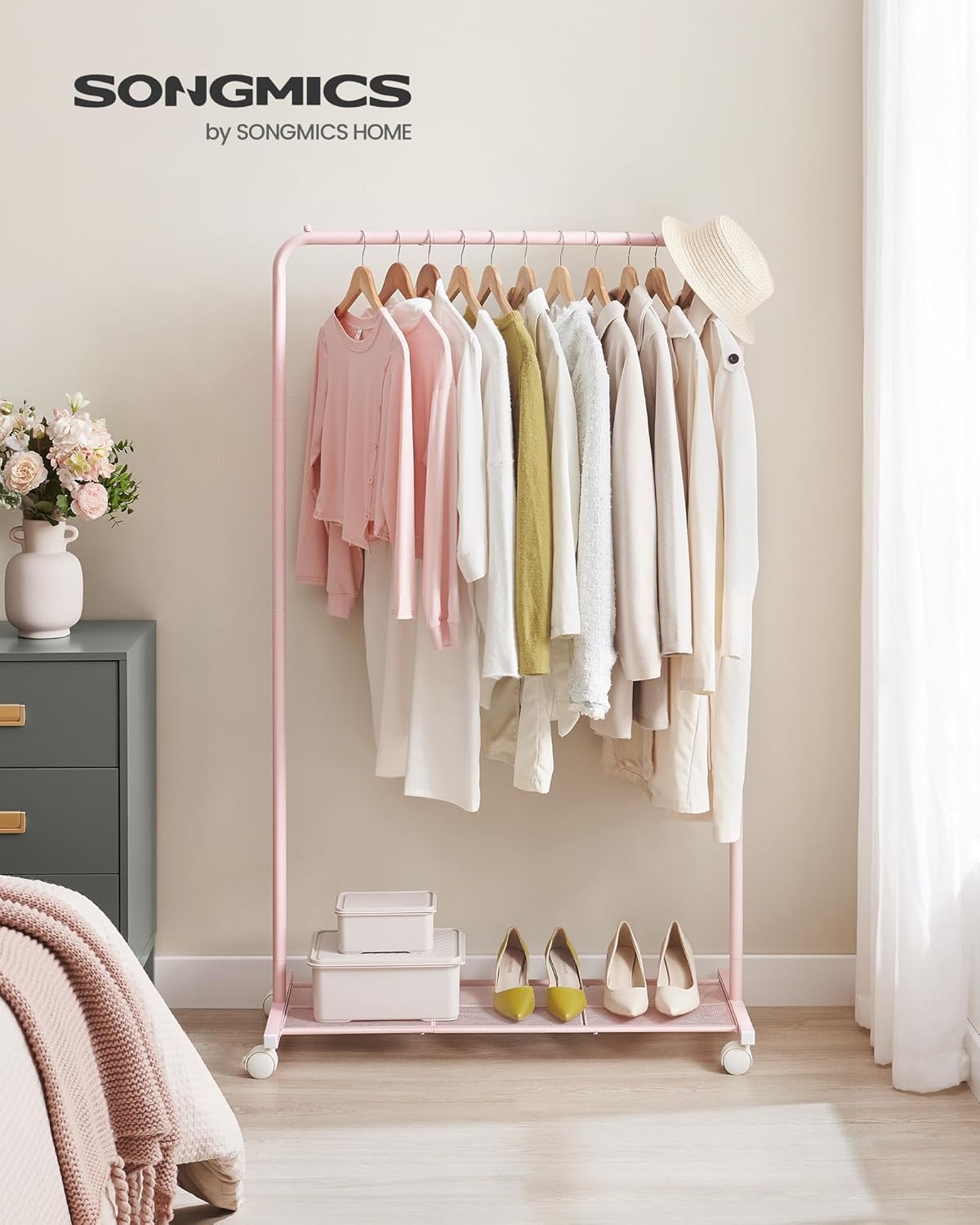 SONGMICS Clothes Rack with Wheels, Clothing Rack for Hanging Clothes, 25.4mm Metal Garment Rack with Dense Mesh Storage Shelf, 110 lb Load Capacity, 2 Brakes, Pink UHSR025P01