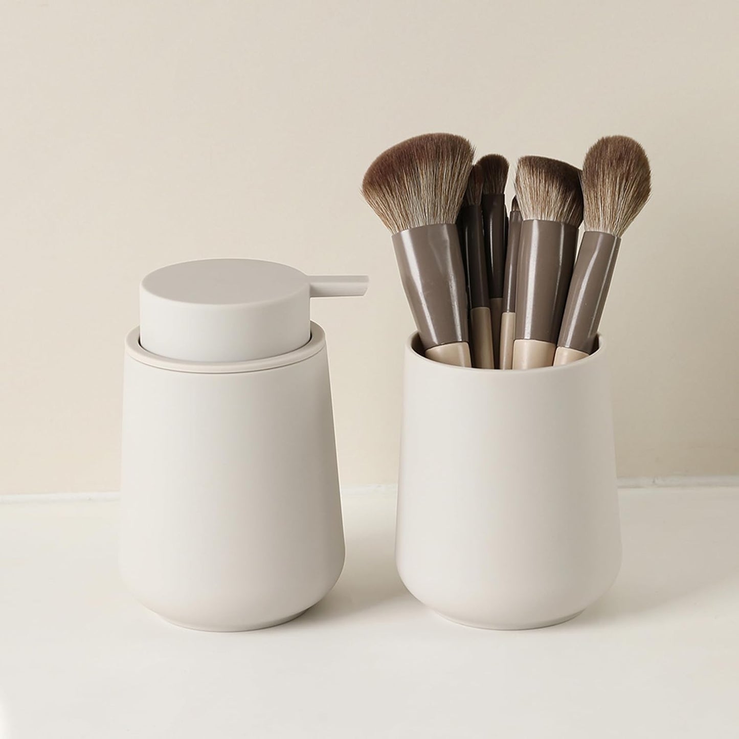 Matte Beige Bathroom Accessories 2 Piece Set Plastic Soap Dispenser and Toothbrush Holder for Modern Bathroom Decor